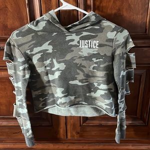 Cropped hoodie with ripped holes.